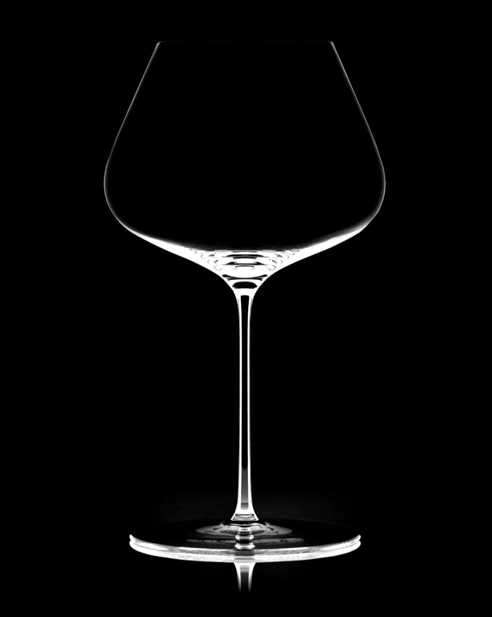 The Zalto Balance glass drawn in light on a black background